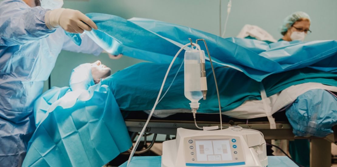 Patient-being-prepared-for-surgery-on-operating-table
