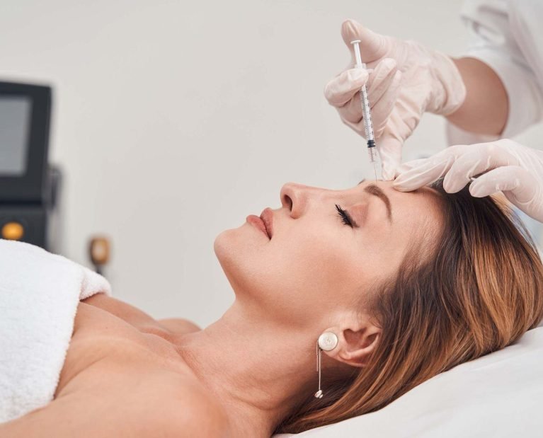 calm attractive woman visiting beauty clinic for f SMH7F8T 2 1 - Cocoona Plastic Surgery Dubai